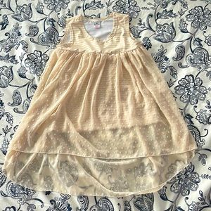 A dress that comes with a detachable flower pin